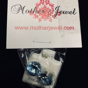 Faux‎ aquamarine stud earrings new in package